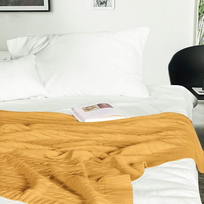 NTBAY 100% Pure Cotton Cable Knit Throw Blanket, Super Soft Warm 51x67 Knitted Throw Blanket for Couch, Sofa, Chair, Bed - Extra Cozy, Machine Washable, Comfortable Home Decor, Ginger Yellow