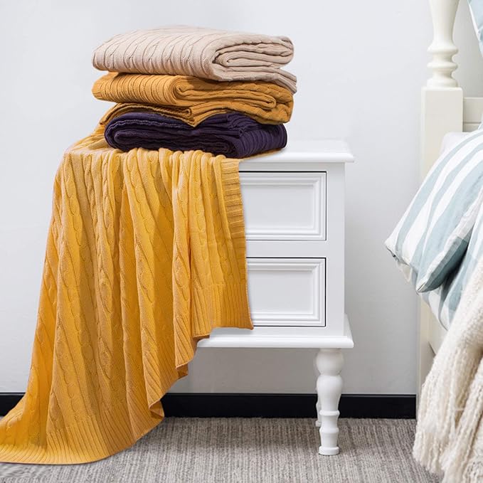 NTBAY 100% Pure Cotton Cable Knit Throw Blanket, Super Soft Warm 51x67 Knitted Throw Blanket for Couch, Sofa, Chair, Bed - Extra Cozy, Machine Washable, Comfortable Home Decor, Ginger Yellow