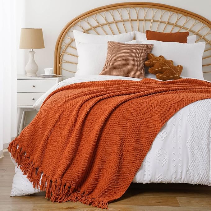 BATTILO HOME Burnt Orange Throw Blanket for Couch, Knit Fall Decor Blanket Versatile for Chair, Decorative Halloween Blanket with Tassels for Bed, 60" x 80"