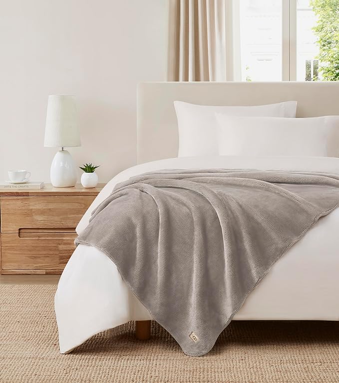 UGG Whitecap Plush Throw Blanket Fleece Lightweight Soft Cozy Throw for Couch Luxury Home Decor for Living Room Machine Washable Hypoallergenic Flannel Blankets, 50-inch x 70-inch, Light Grey Seal