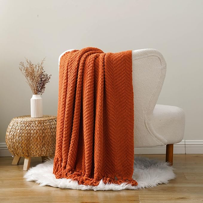 BATTILO HOME Burnt Orange Throw Blanket for Couch, Knit Fall Decor Blanket Versatile for Chair, Decorative Halloween Blanket with Tassels for Bed, 60" x 80"