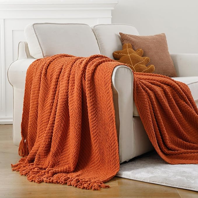 BATTILO HOME Burnt Orange Throw Blanket for Couch, Knit Fall Decor Blanket Versatile for Chair, Decorative Halloween Blanket with Tassels for Bed, 60" x 80"