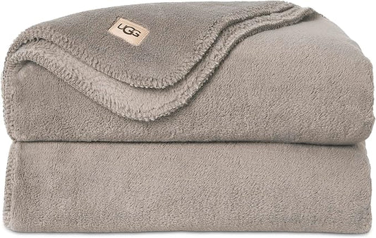 UGG Whitecap Plush Throw Blanket Fleece Lightweight Soft Cozy Throw for Couch Luxury Home Decor for Living Room Machine Washable Hypoallergenic Flannel Blankets, 50-inch x 70-inch, Light Grey Seal
